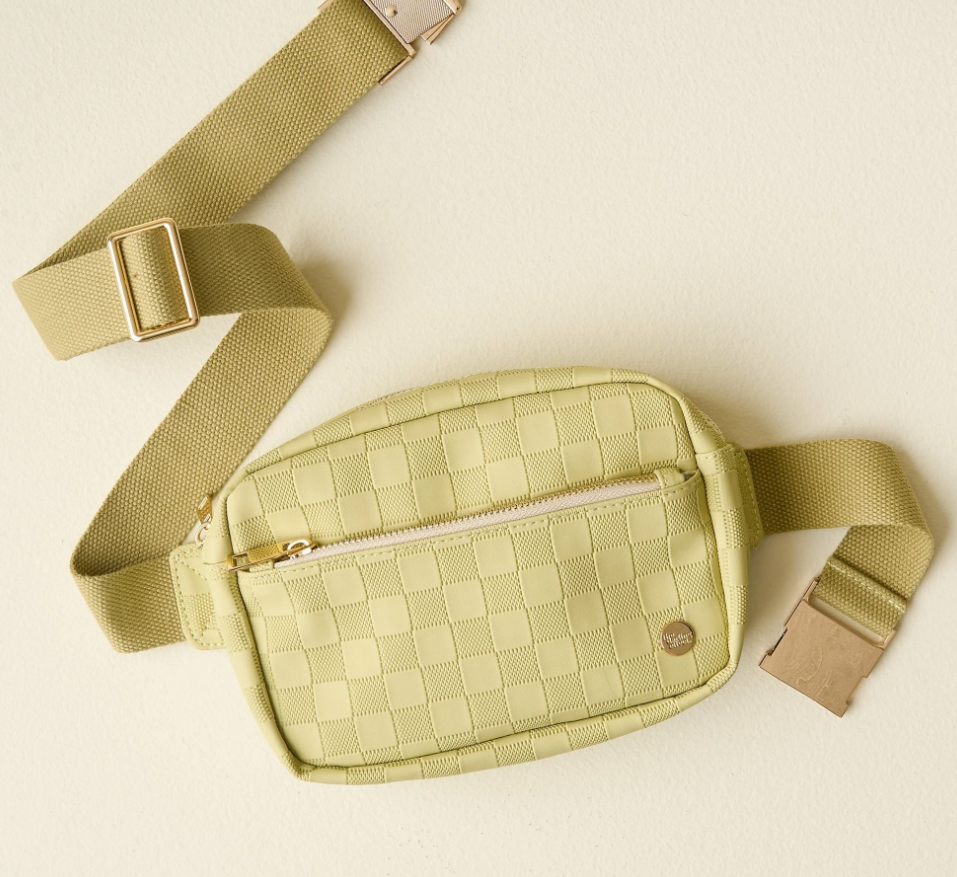 green checkered belt bag on white background.